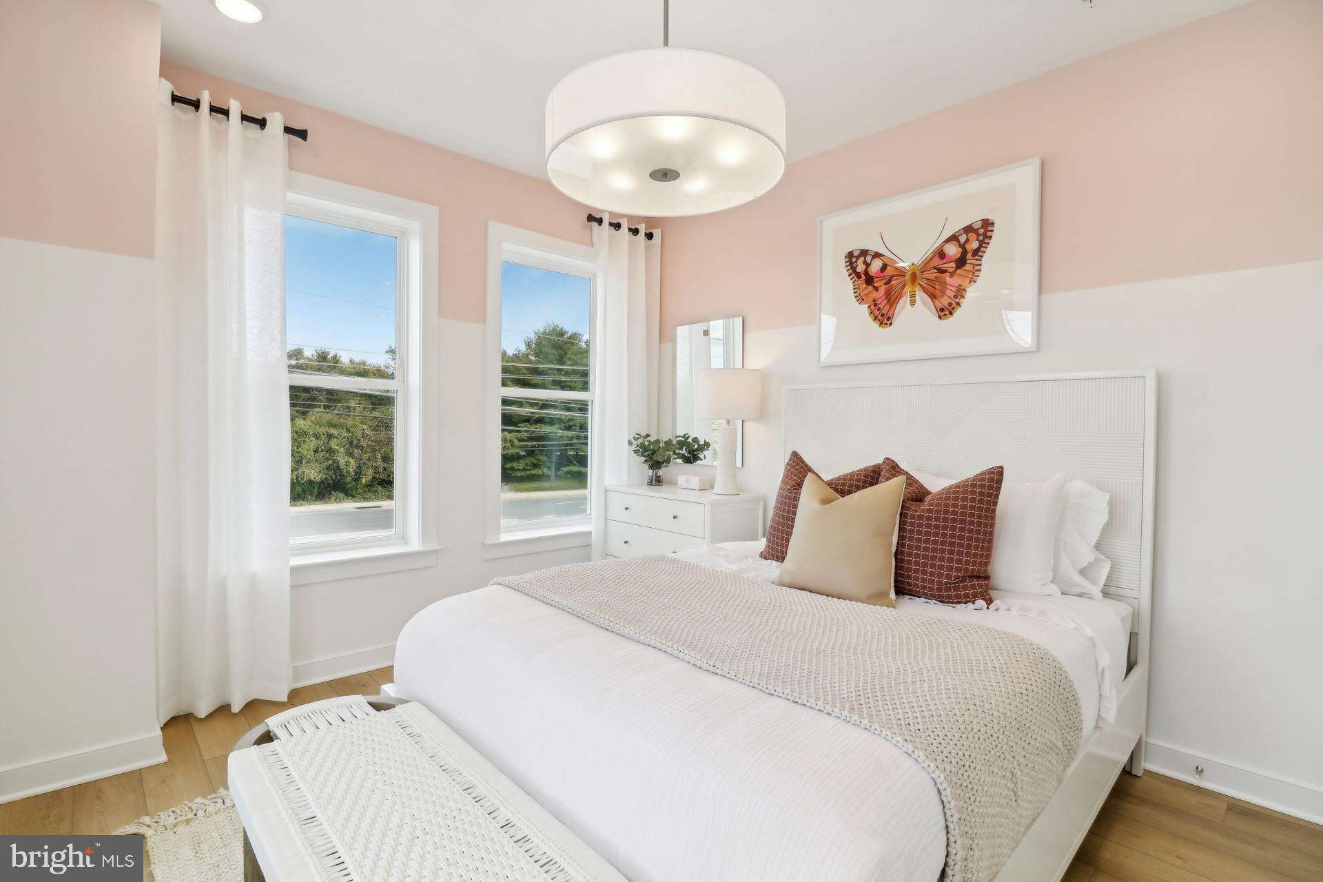 16104 Frederick Road Rockville, MD 20850 - Photo 13 of 34 a bedroom with bed and a window