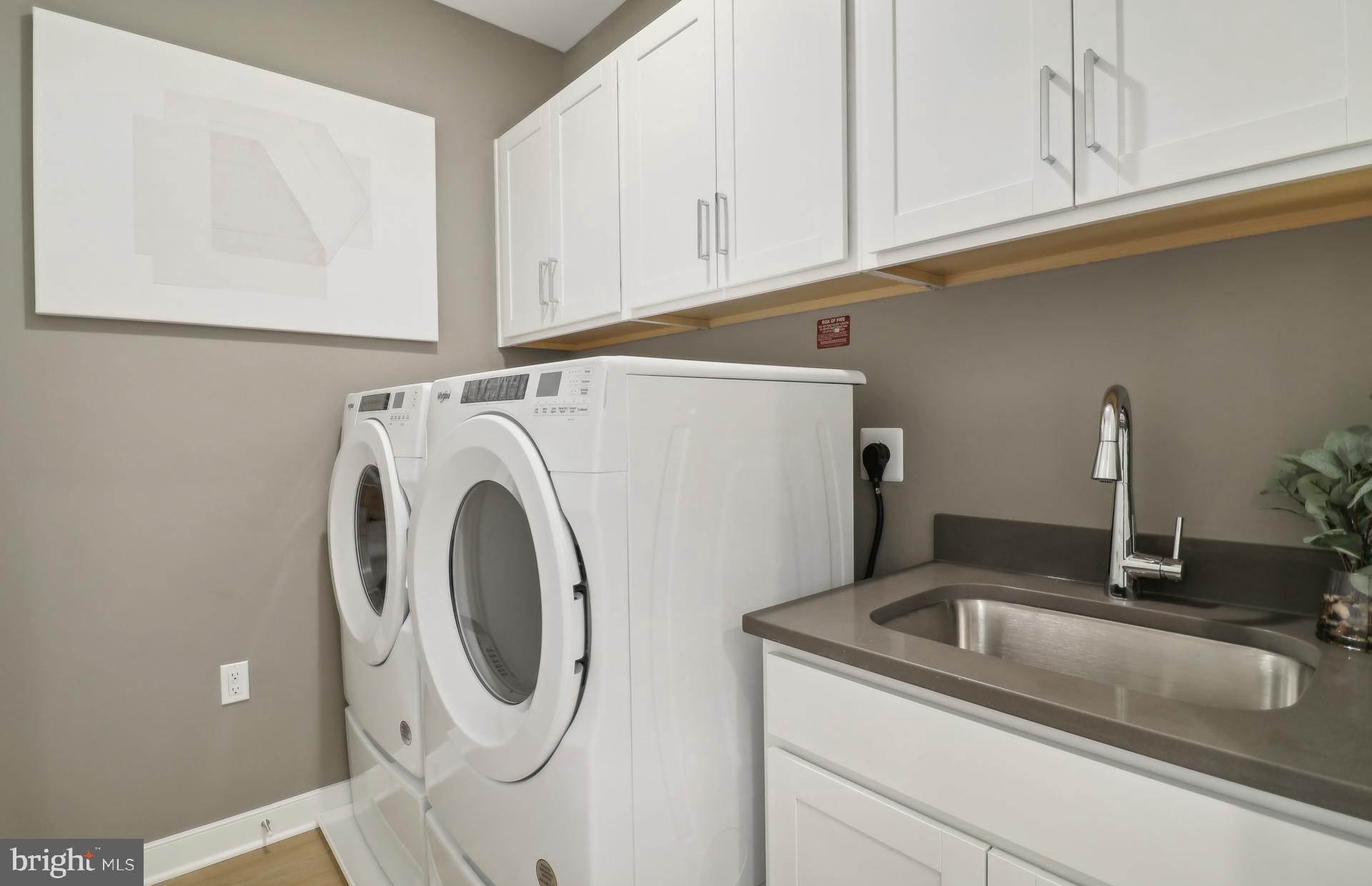 16104 Frederick Road Rockville, MD 20850 - Photo 15 of 34 a utility room with dryer and washer