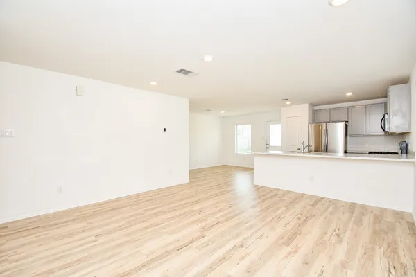 a view of kitchen with wooden floor