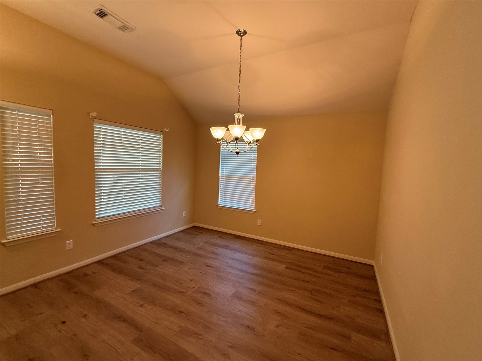 19407 Rosebud Ridge Way Spring, TX 77379 - Photo 9 of 18 a view of a room with window and wooden floor