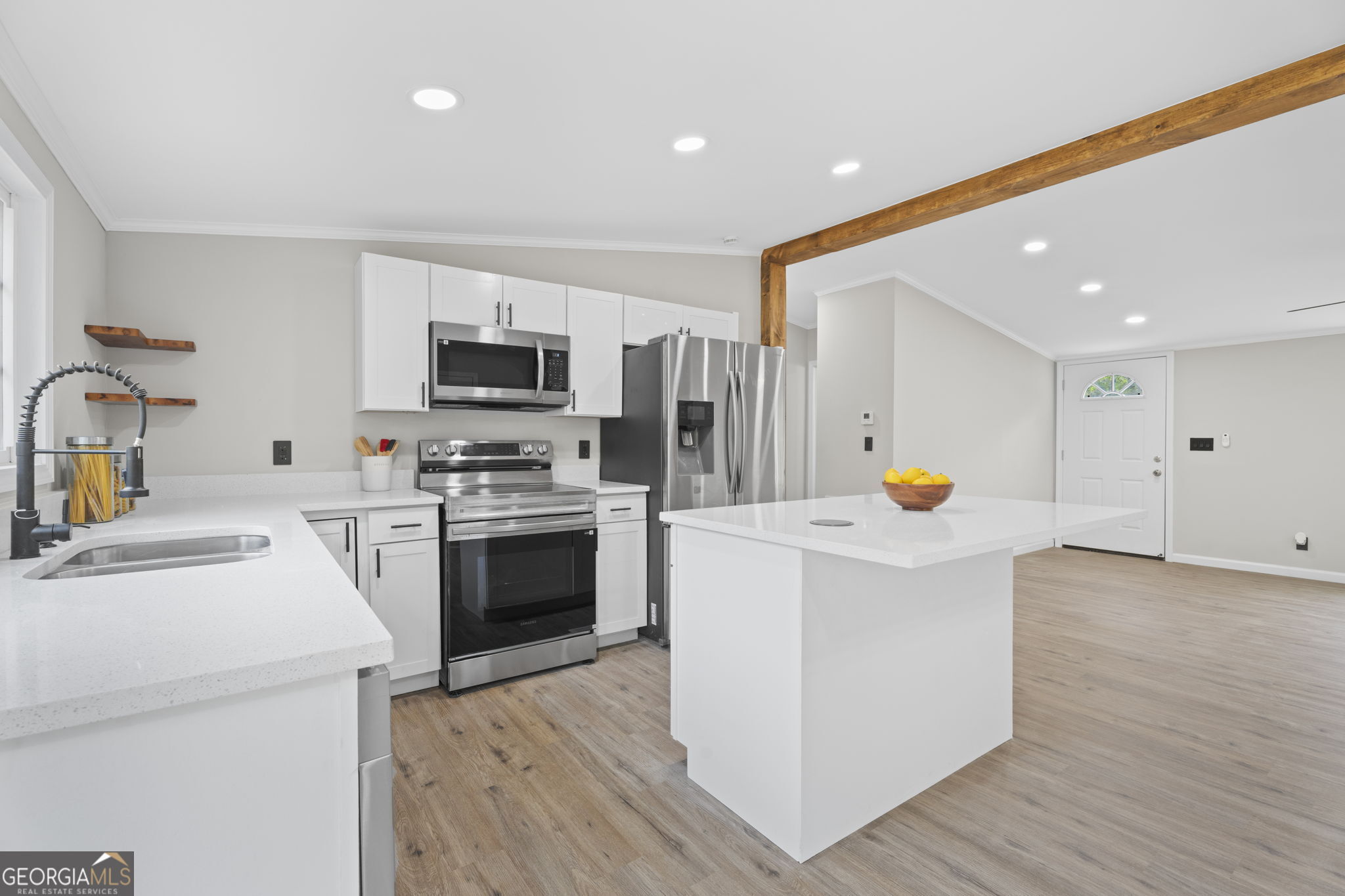 110 Kathy Lane Temple, GA 30179 - Photo 11 of 24 a kitchen with a sink a stove and refrigerator