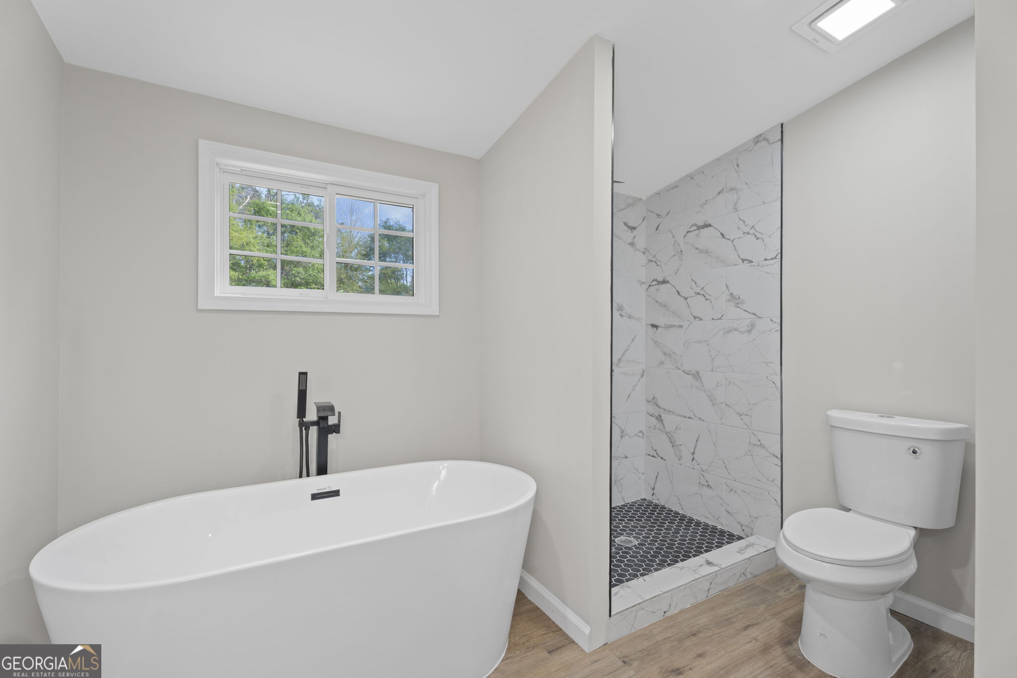 110 Kathy Lane Temple, GA 30179 - Photo 15 of 24 a white bath tub sitting next to a toilet