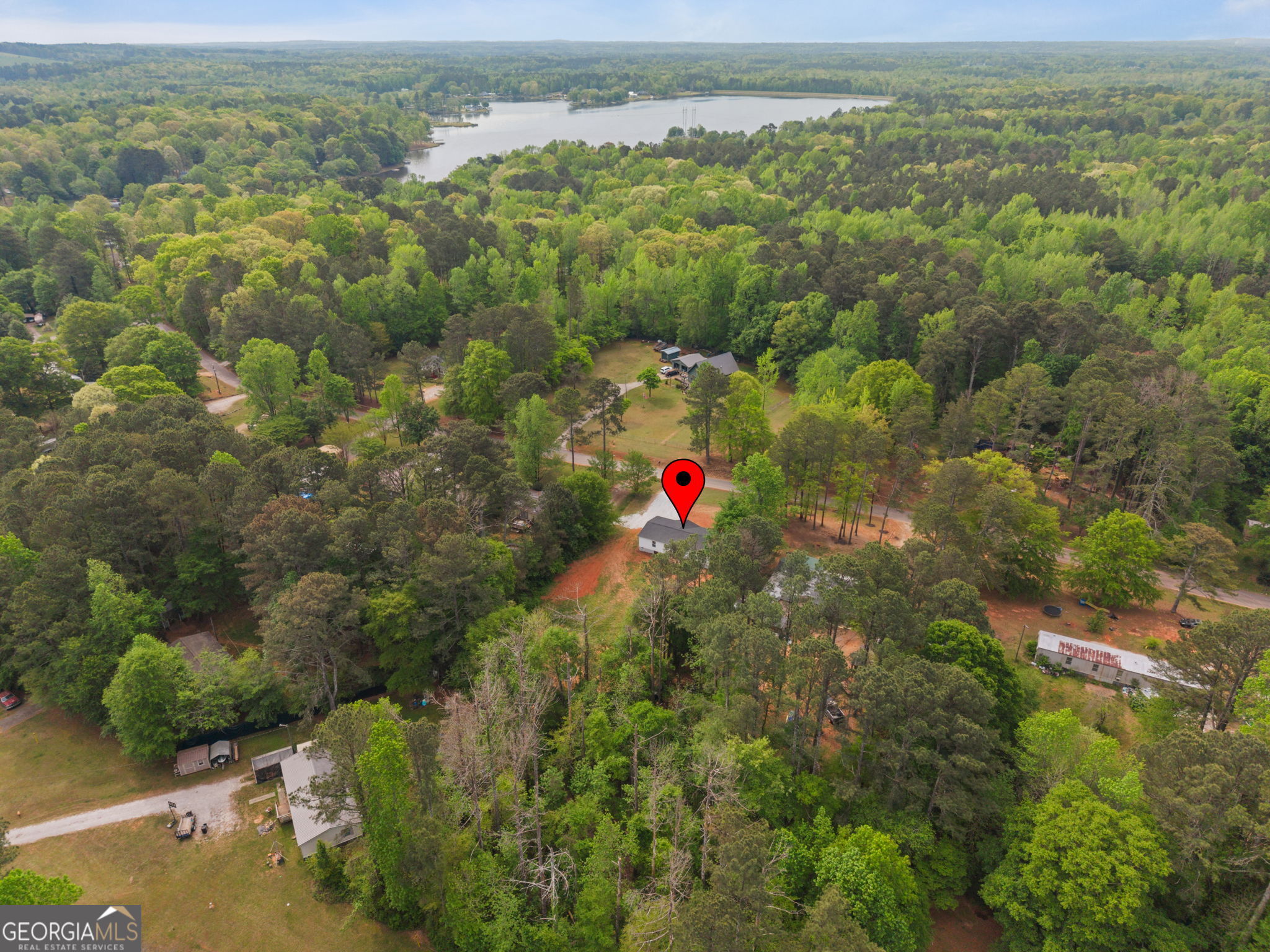 110 Kathy Lane Temple, GA 30179 - Photo 22 of 24 an aerial view of residential houses with outdoor space and trees