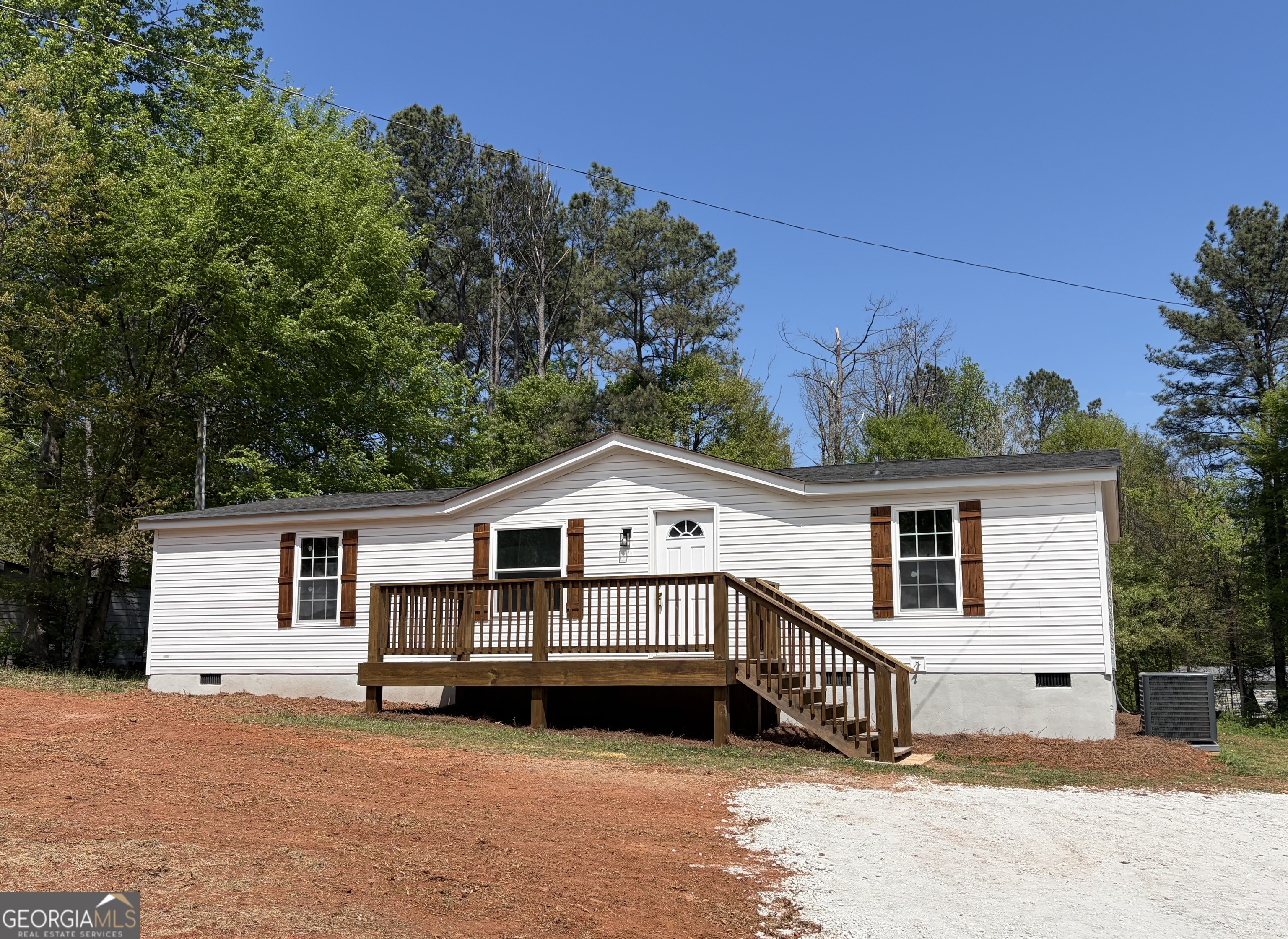 110 Kathy Lane Temple, GA 30179 - Photo 24 of 24 a view of a house with a backyard and a patio