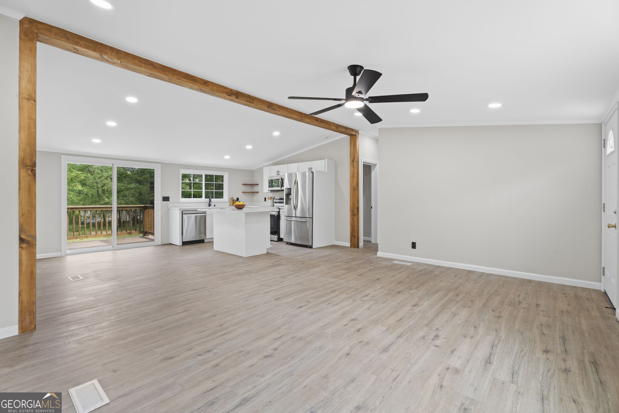 110 Kathy Lane Temple, GA 30179 - Photo 6 of 24 a view of a livingroom with a ceiling fan hardwood floor and a ceiling fan