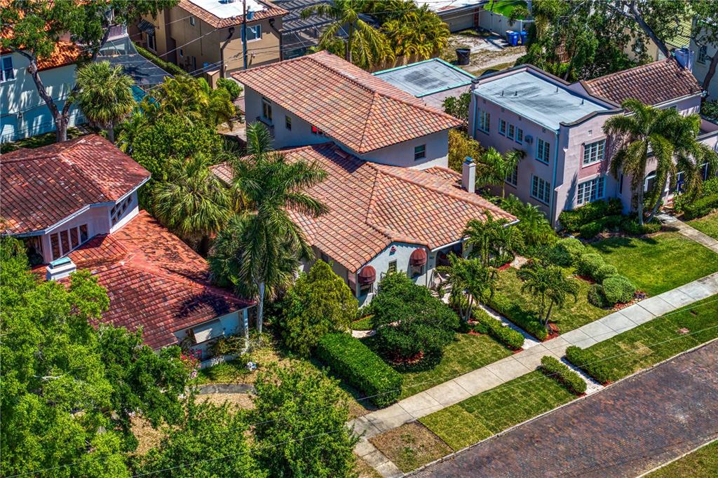 2421 Brevard Road Northeast St. Petersburg, FL 33704 - Photo 3 of 35 an aerial view of a house with a garden
