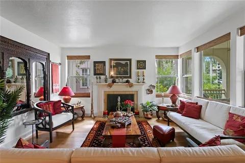 a dining room with furniture and window