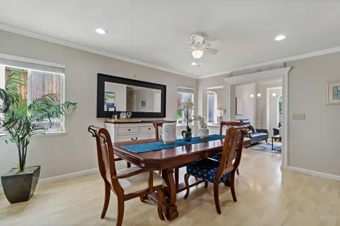 a view of a dining room with furniture