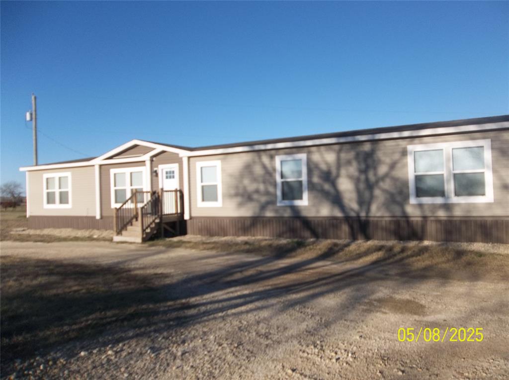 a view of a house with a outdoor space