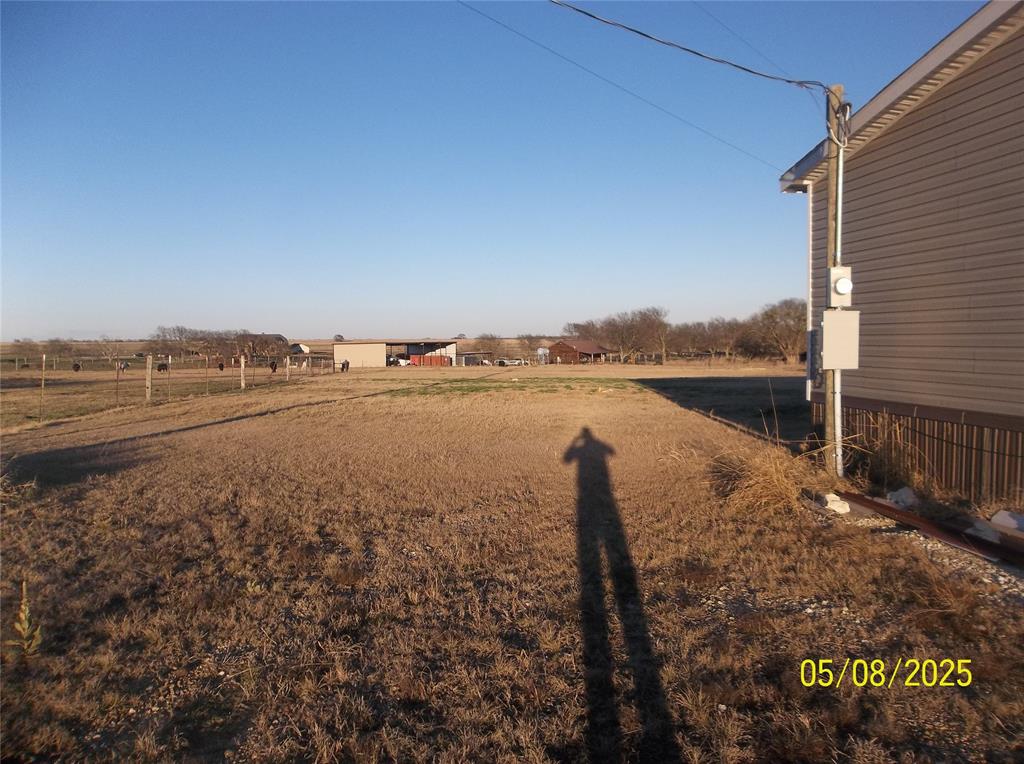 531 Blair Road Waxahachie, TX 75165 - Photo 36 of 40 a view of a lake with houses in the back