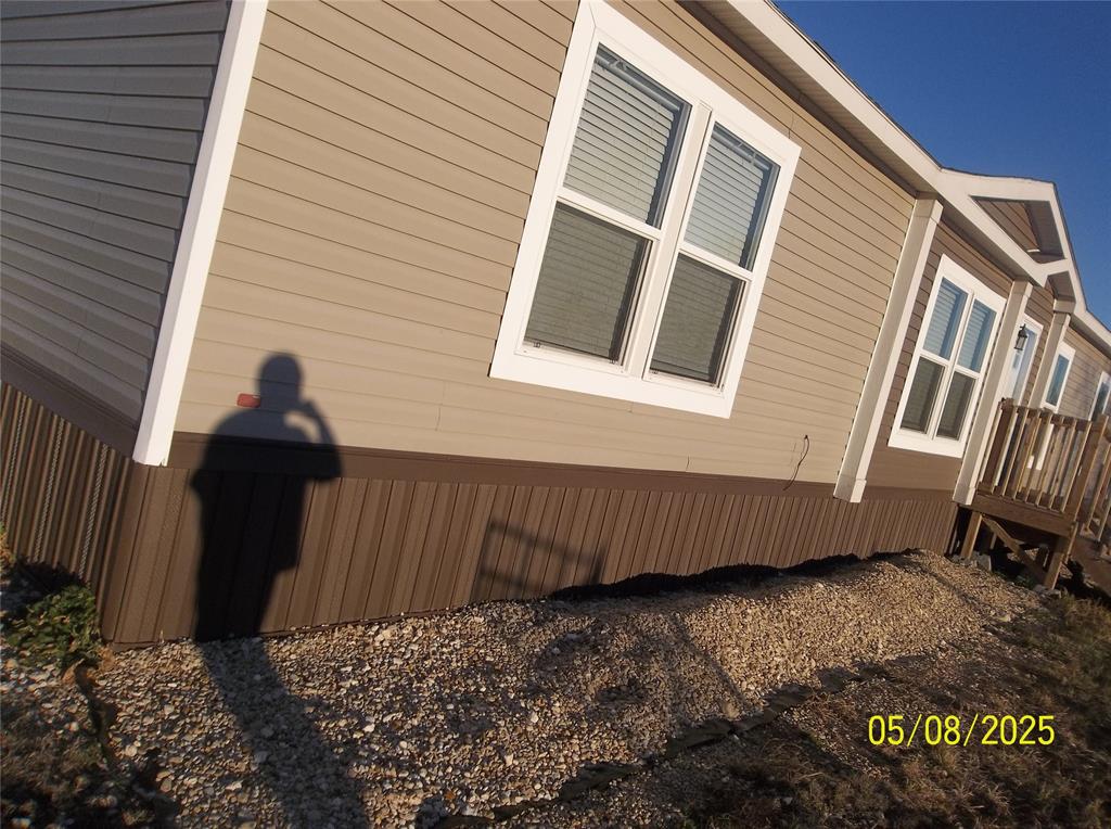 531 Blair Road Waxahachie, TX 75165 - Photo 38 of 40 a view of a backyard with sitting area