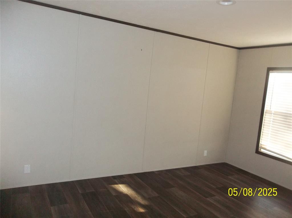 531 Blair Road Waxahachie, TX 75165 - Photo 8 of 40 a view of an empty room with a window