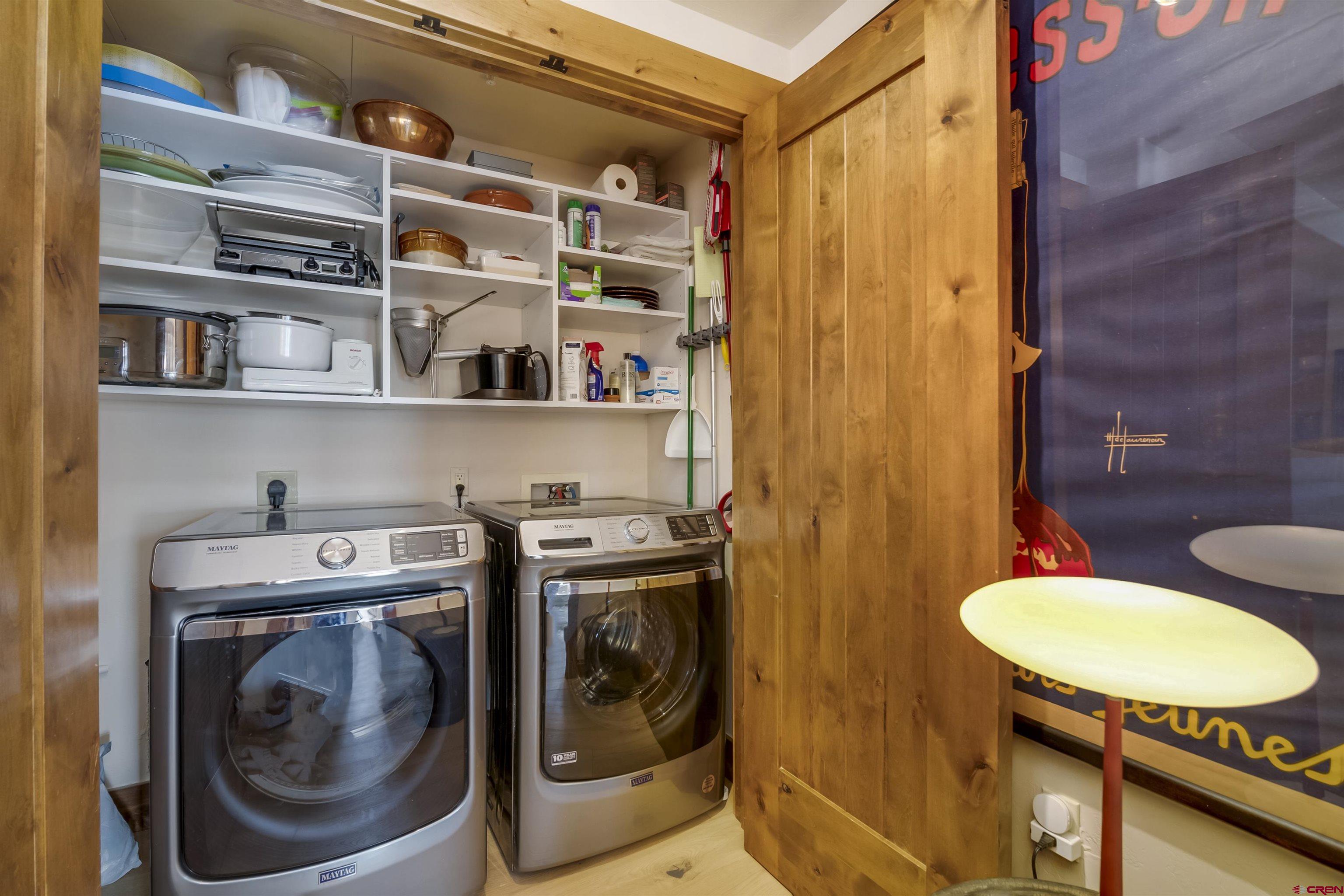 14 Hunter Hill Road, Unit A204 Crested Butte, CO 81225 - Photo 15 of 36 a utility room with dryer and washer