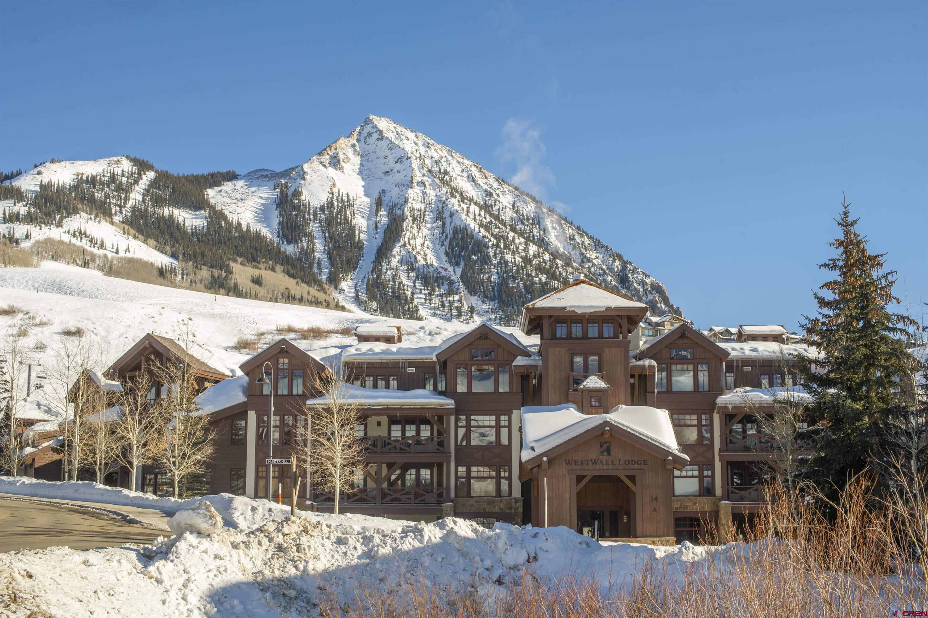 14 Hunter Hill Road, Unit A204 Crested Butte, CO 81225 - Photo 2 of 36 a front view of a house