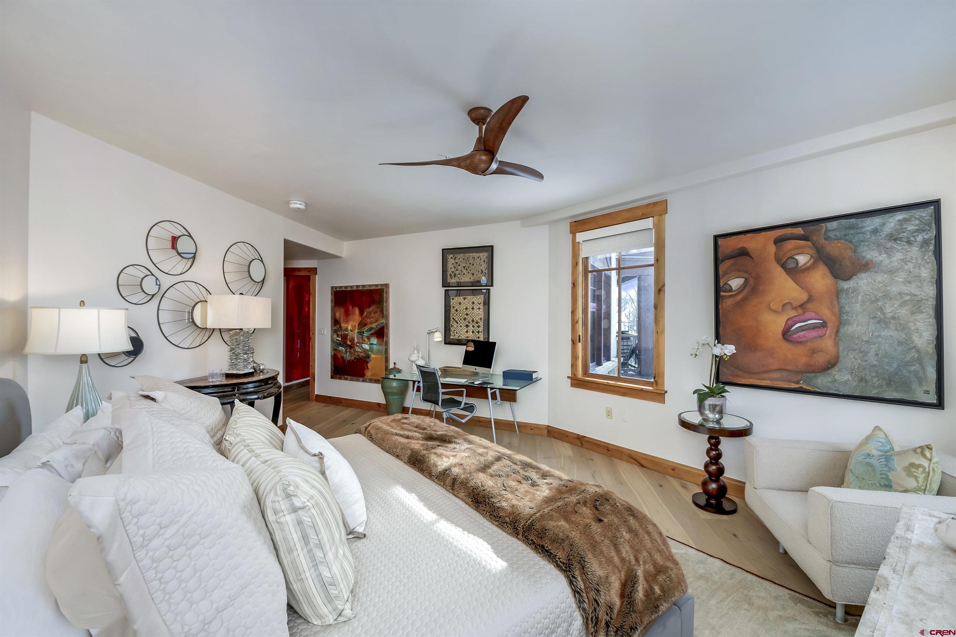 14 Hunter Hill Road, Unit A204 Crested Butte, CO 81225 - Photo 21 of 36 a bedroom with furniture or couch and a window