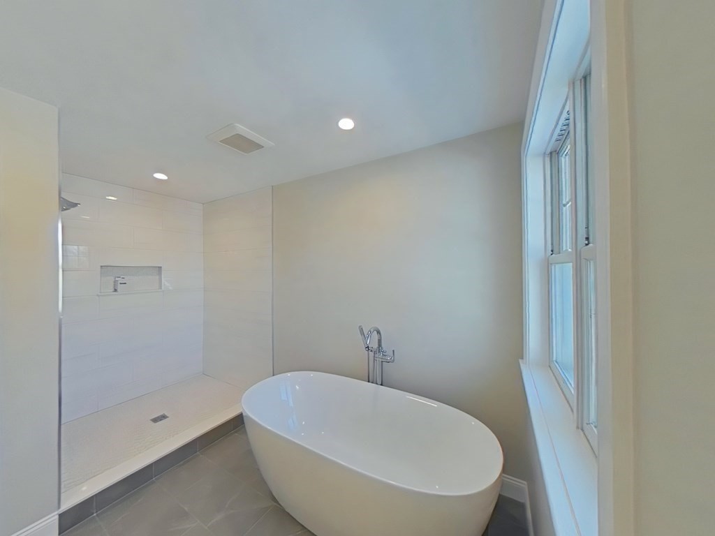 65 Emerson Road Needham, MA 02492 - Photo 28 of 37 a bathroom with a toilet and shower