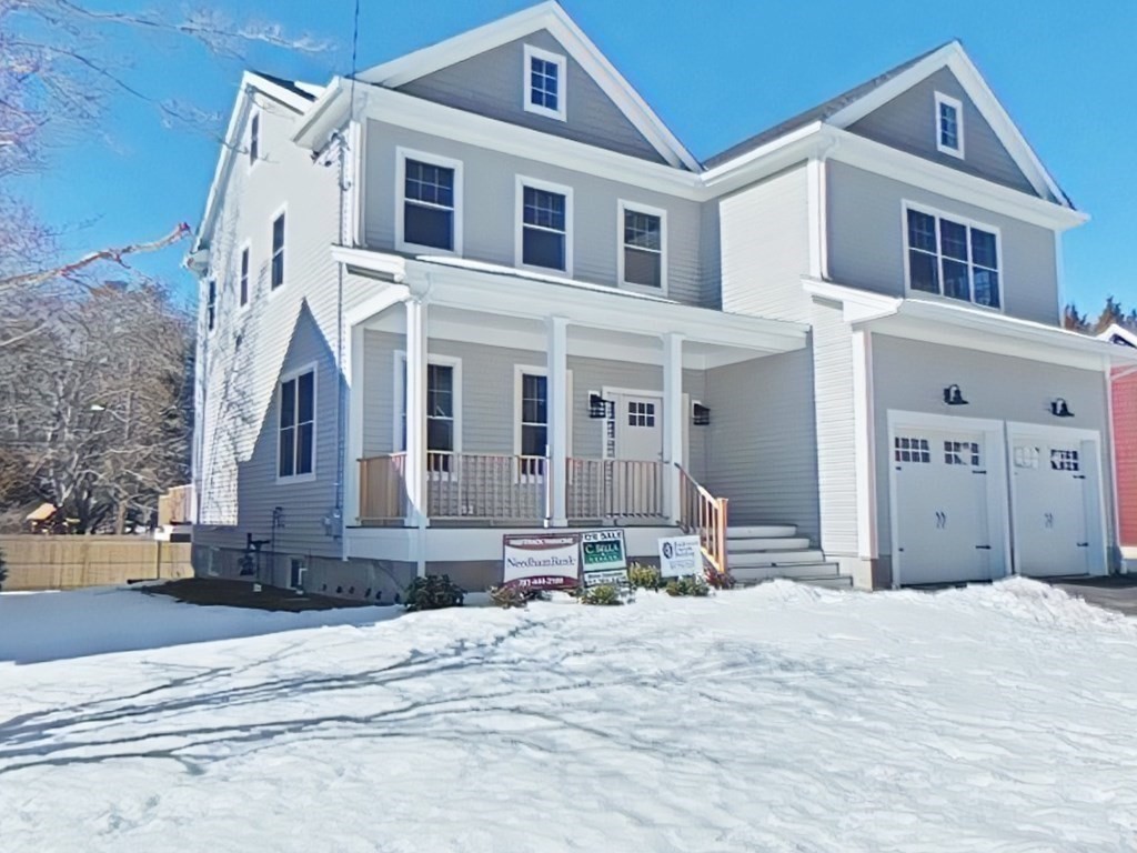 65 Emerson Road Needham, MA 02492 - Photo 3 of 37 a front view of a house with a yard