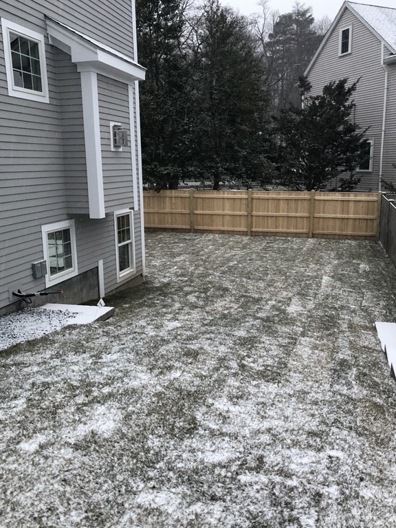 65 Emerson Road Needham, MA 02492 - Photo 36 of 37 a view of a backyard