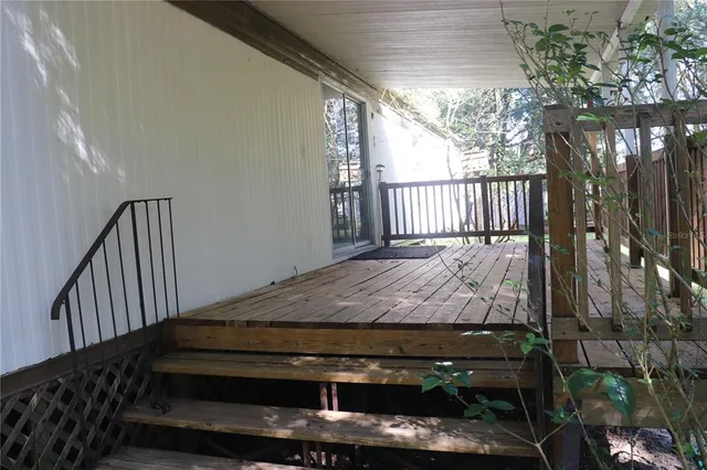 a bed sitting in a balcony
