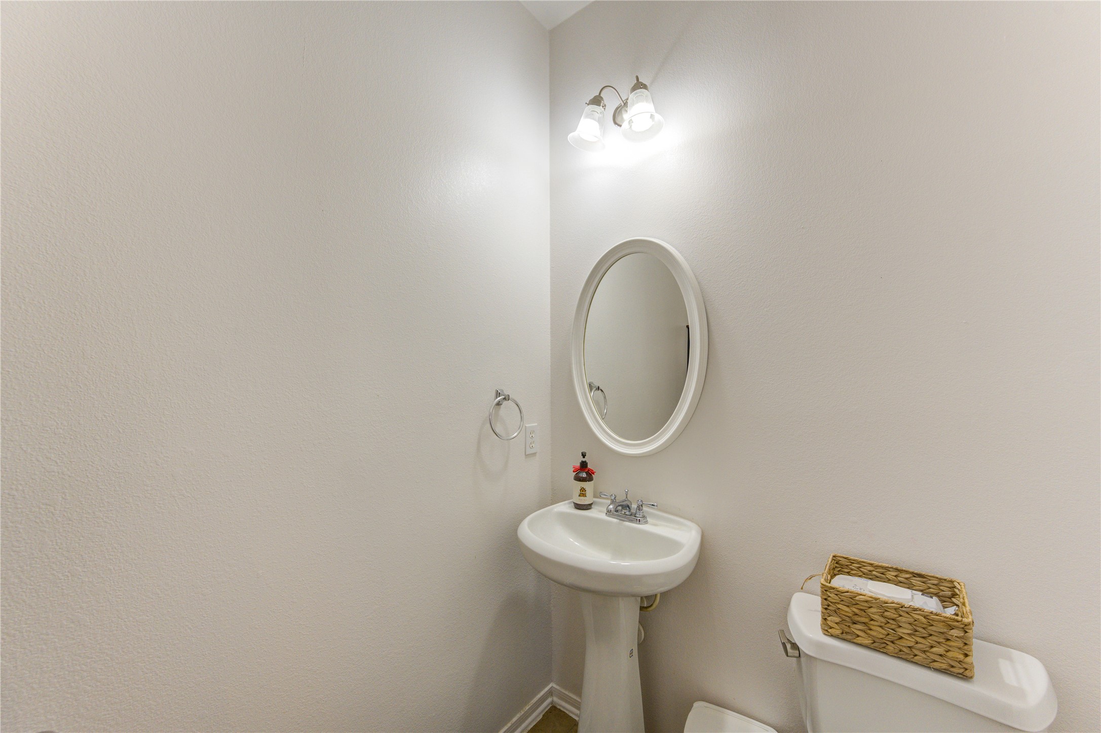 25210 Hazel Ranch Drive Katy, TX 77494 - Photo 18 of 45 a bathroom with a toilet and a sink