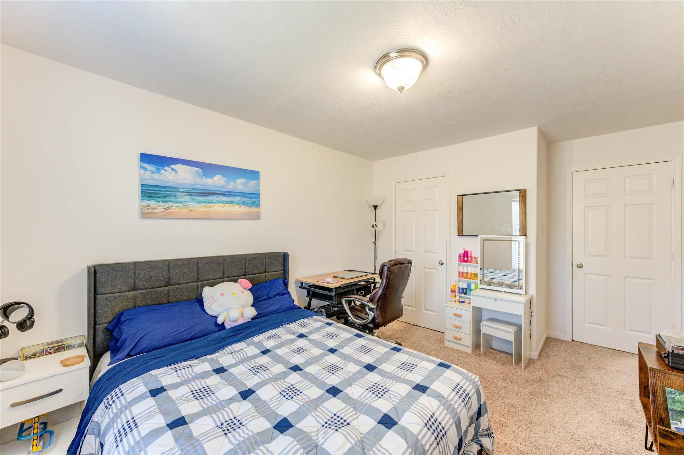 25210 Hazel Ranch Drive Katy, TX 77494 - Photo 28 of 45 a bedroom that has a bed and a chair in it