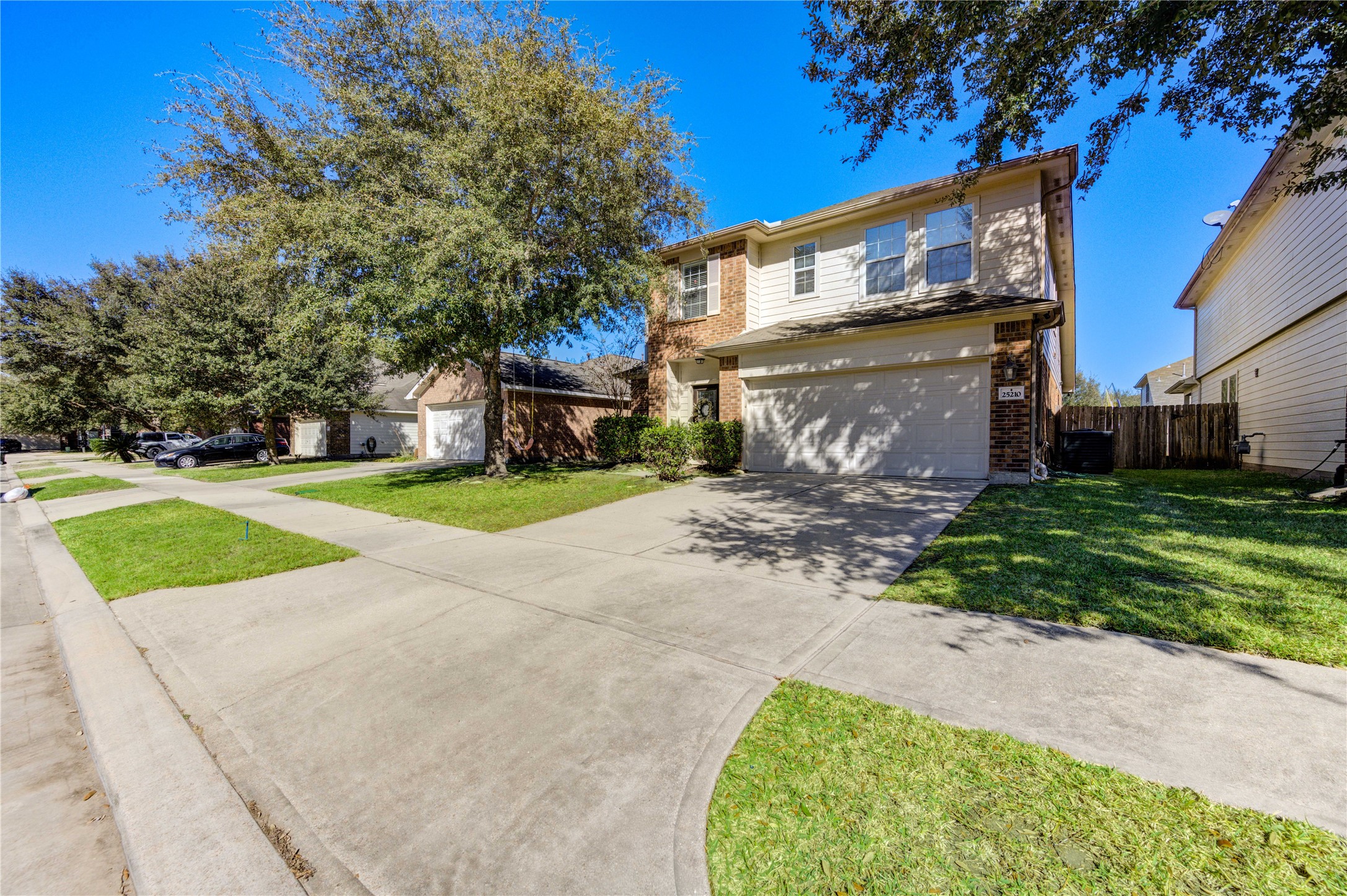 25210 Hazel Ranch Drive Katy, TX 77494 - Photo 3 of 45 a view of a house with a yard