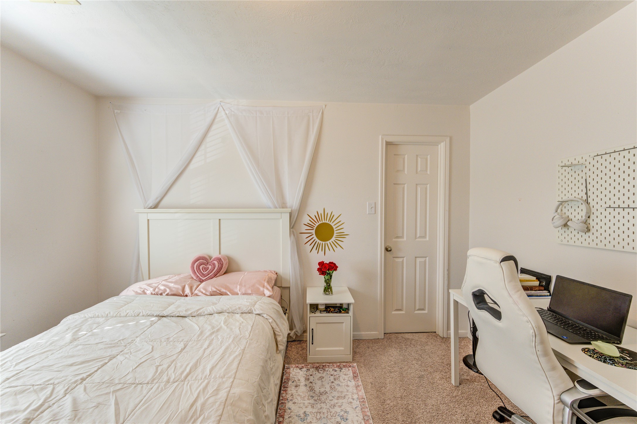 25210 Hazel Ranch Drive Katy, TX 77494 - Photo 36 of 45 a bed room with a bed and a chair