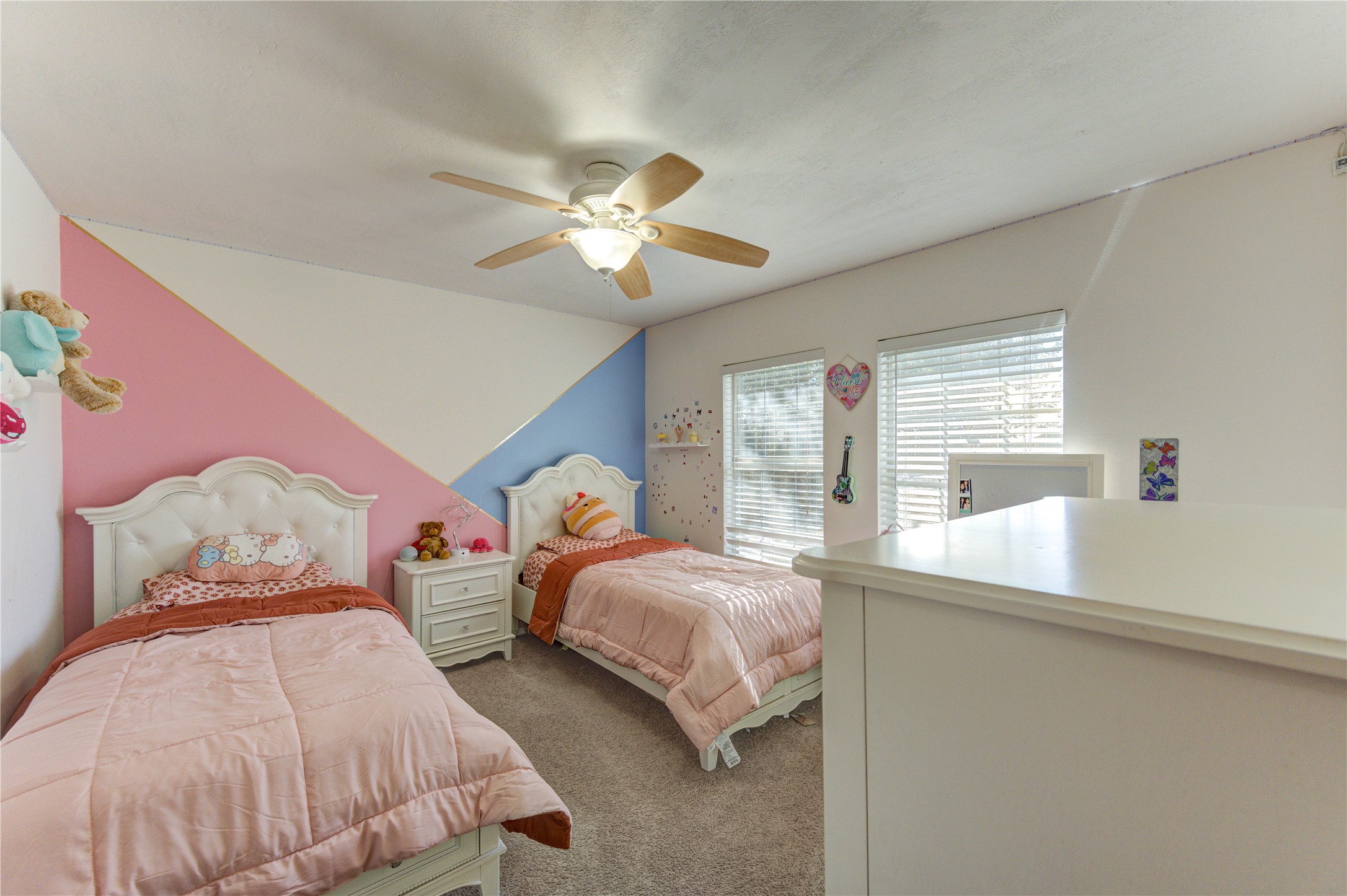 25210 Hazel Ranch Drive Katy, TX 77494 - Photo 40 of 45 a bedroom with two beds and a window