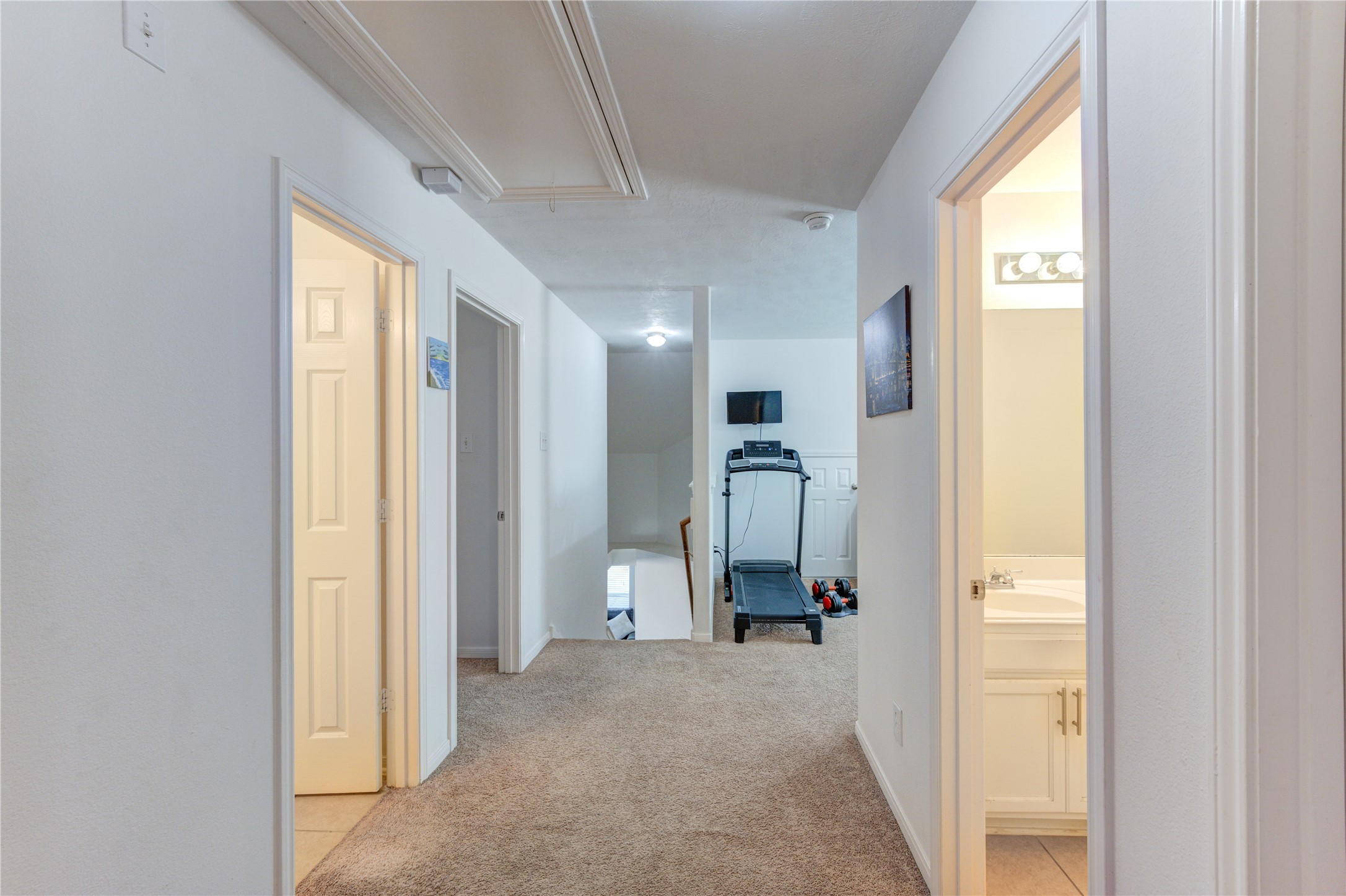 25210 Hazel Ranch Drive Katy, TX 77494 - Photo 41 of 45 a view of a hallway with a furniture and a livingroom view