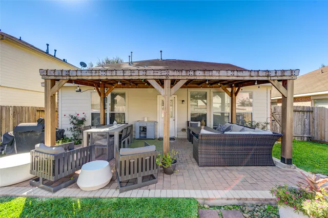 a view of a table and chairs in patio