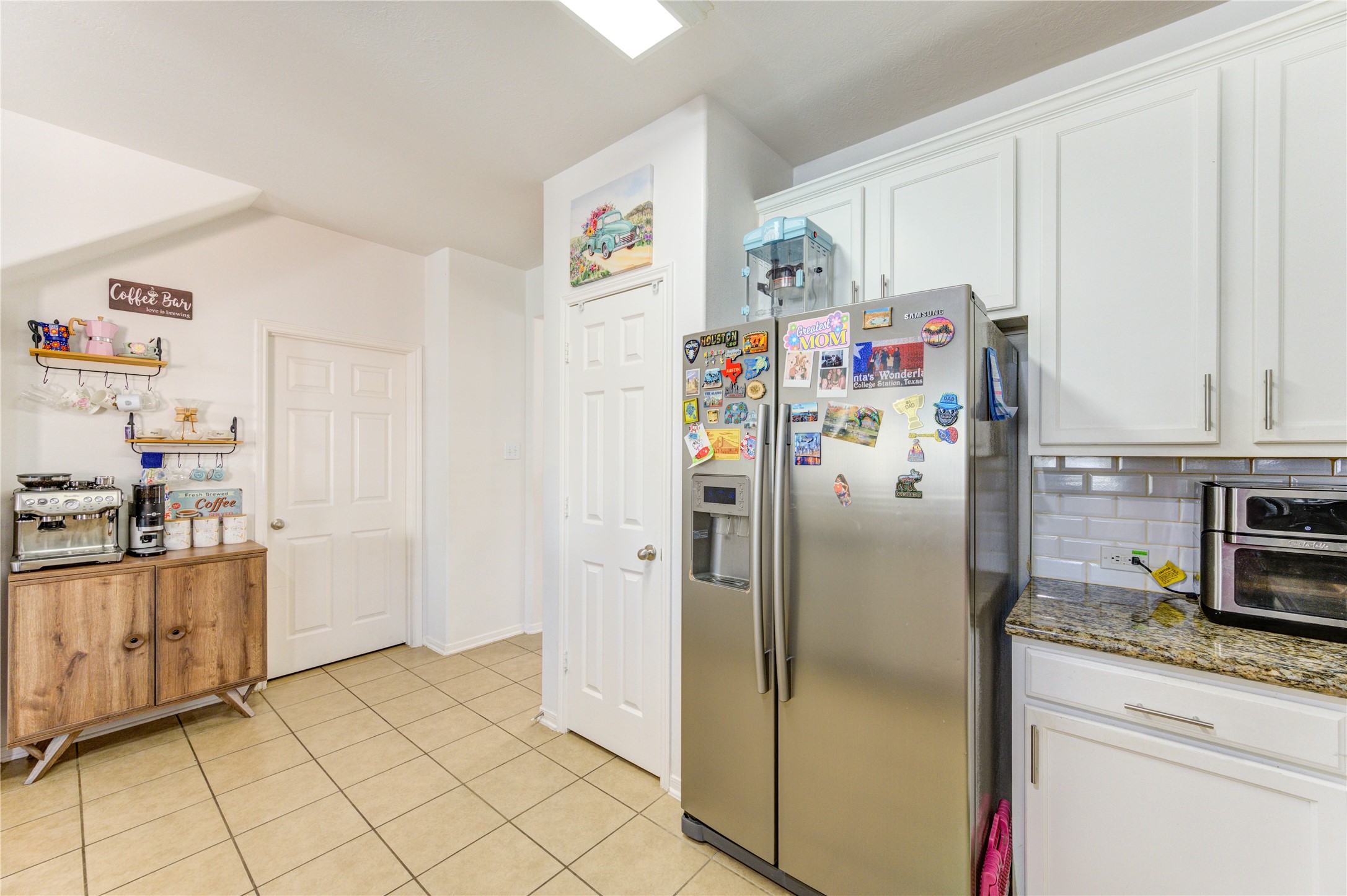 25210 Hazel Ranch Drive Katy, TX 77494 - Photo 10 of 45 a kitchen with stainless steel appliances granite countertop a refrigerator and a sink
