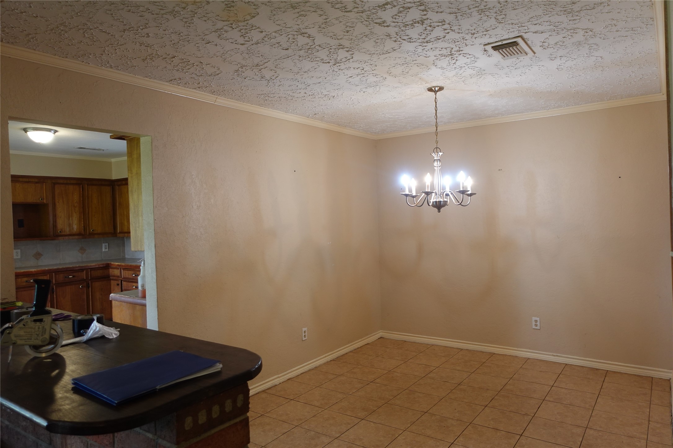 20027 Chipplegate Lane Humble, TX 77338 - Photo 11 of 32 a view of a room with a chandelier