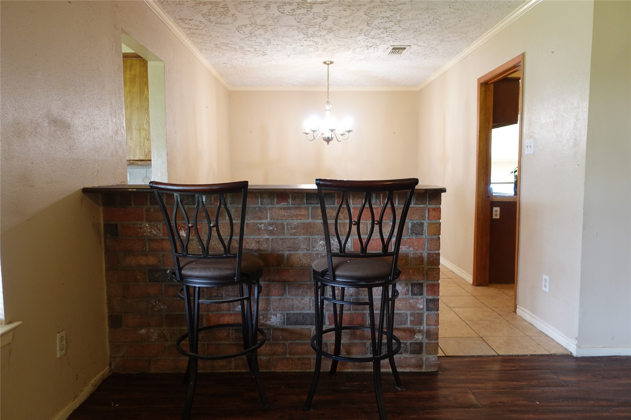 20027 Chipplegate Lane Humble, TX 77338 - Photo 13 of 32 a view of a dining room with furniture and wooden floor