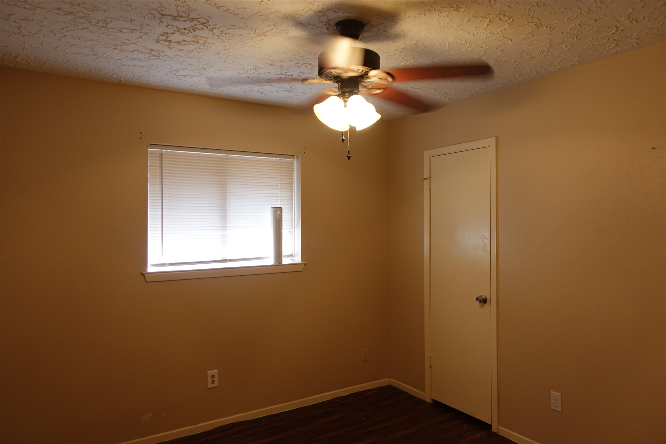 20027 Chipplegate Lane Humble, TX 77338 - Photo 23 of 32 a view of a room with a window and wooden floor