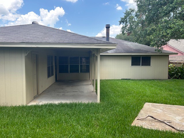 20027 Chipplegate Lane Humble, TX 77338 - Photo 29 of 32 a backyard of a house with lots of green space