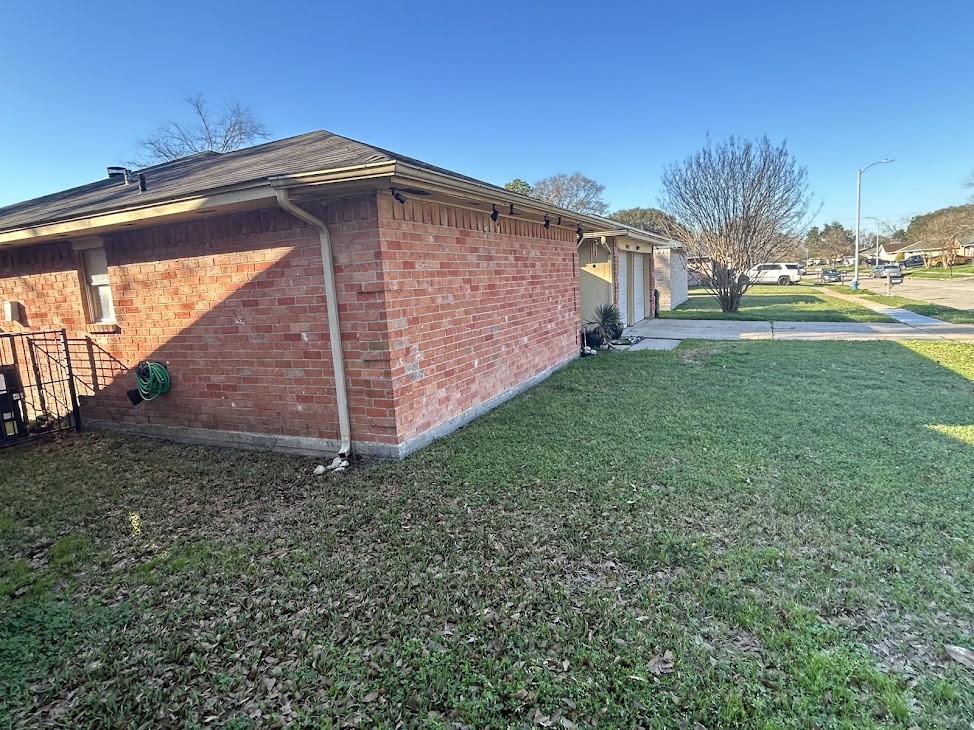 20027 Chipplegate Lane Humble, TX 77338 - Photo 3 of 32 a front view of a house with a yard