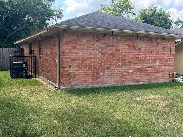 20027 Chipplegate Lane Humble, TX 77338 - Photo 4 of 32 a backyard of a house with lots of green space