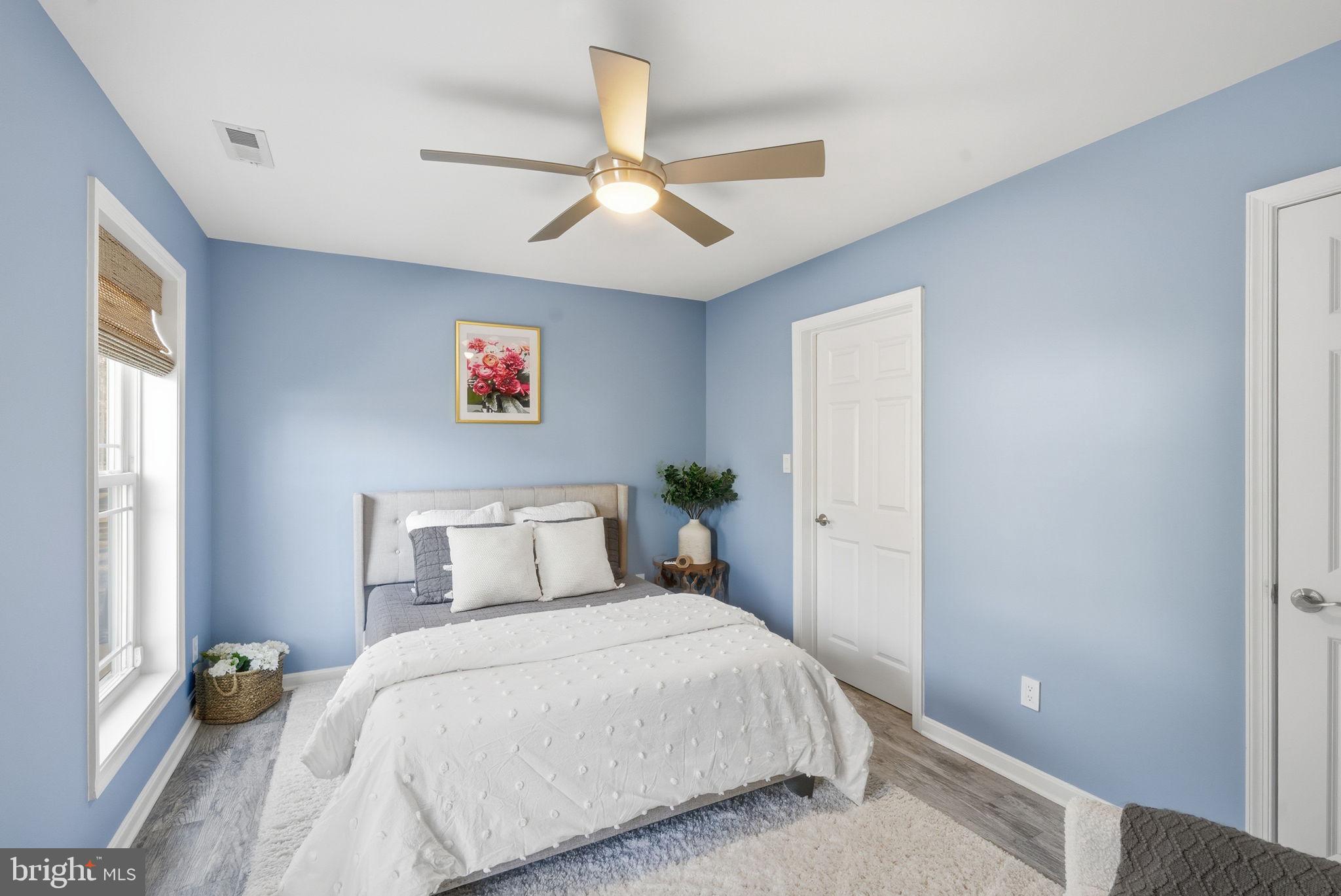 1410 Bennett Point Road Queenstown, MD 21658 - Photo 11 of 36 Main level bedroom with full bathroom