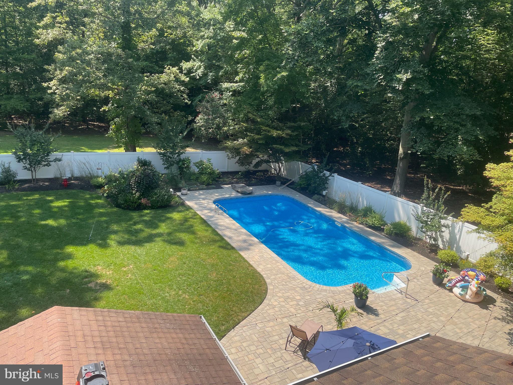 1410 Bennett Point Road Queenstown, MD 21658 - Photo 24 of 36 View of pool, patio, and built-in fire pit