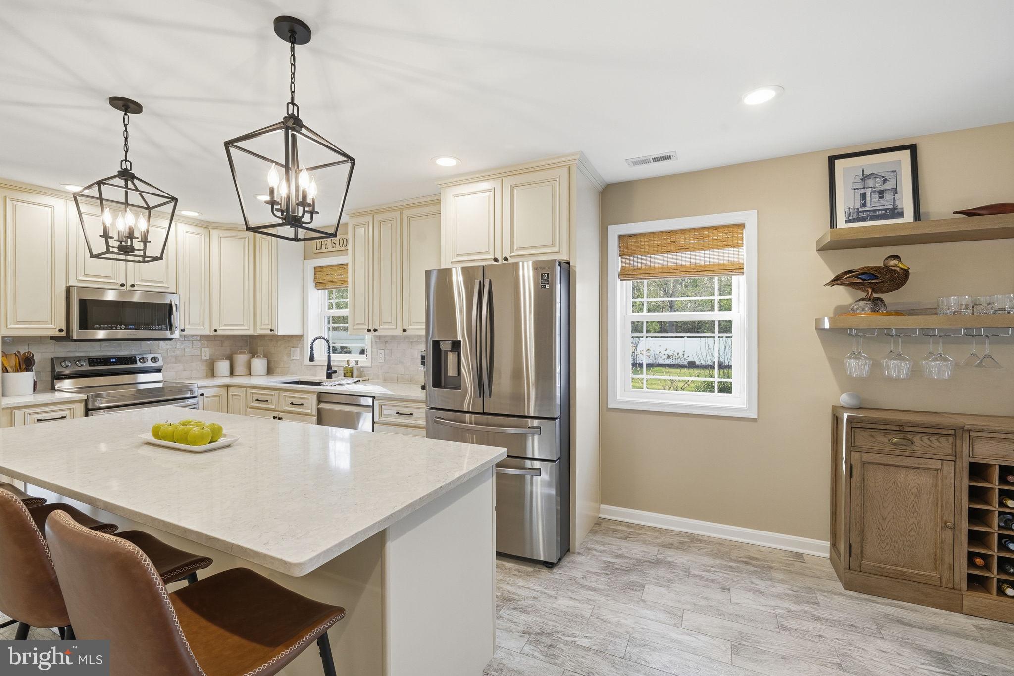 1410 Bennett Point Road Queenstown, MD 21658 - Photo 5 of 36 Modern kitchen with island seating for four