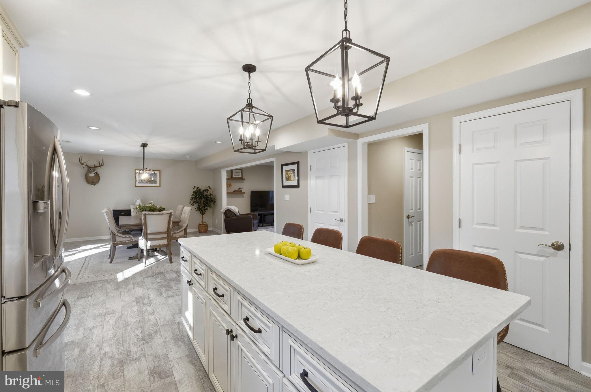 1410 Bennett Point Road Queenstown, MD 21658 - Photo 6 of 36 Kitchen view towards dining room and family room