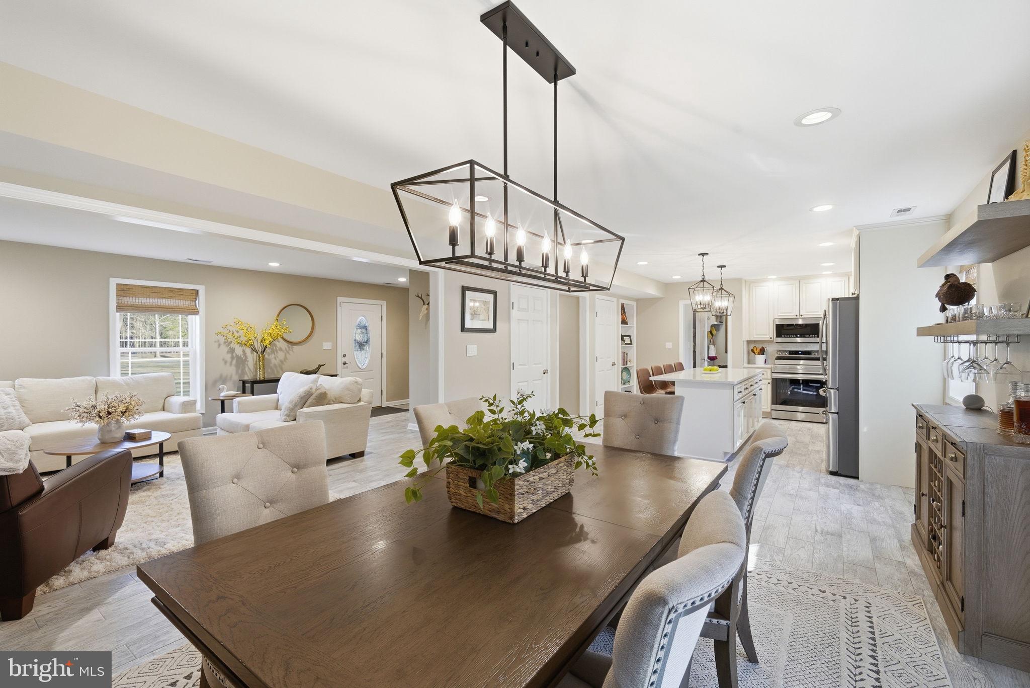 1410 Bennett Point Road Queenstown, MD 21658 - Photo 8 of 36 Dining room view to family room and kitchen