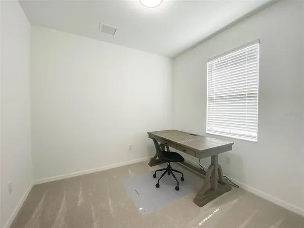 a view of a workspace with a window