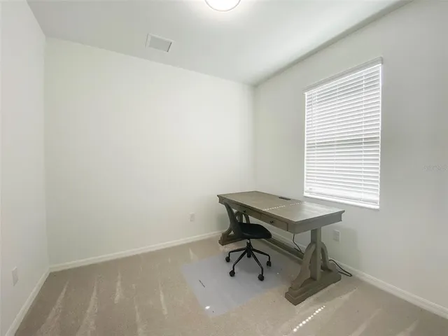 a view of a workspace with a window