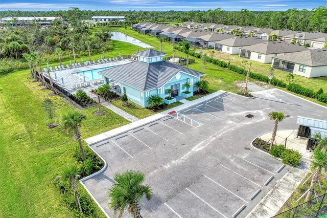 an aerial view of a house with a garden