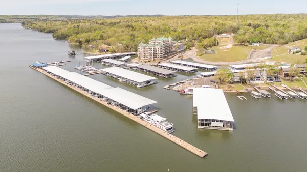 an aerial view of residential house with outdoor space