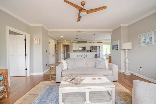 a living room with furniture and a rug
