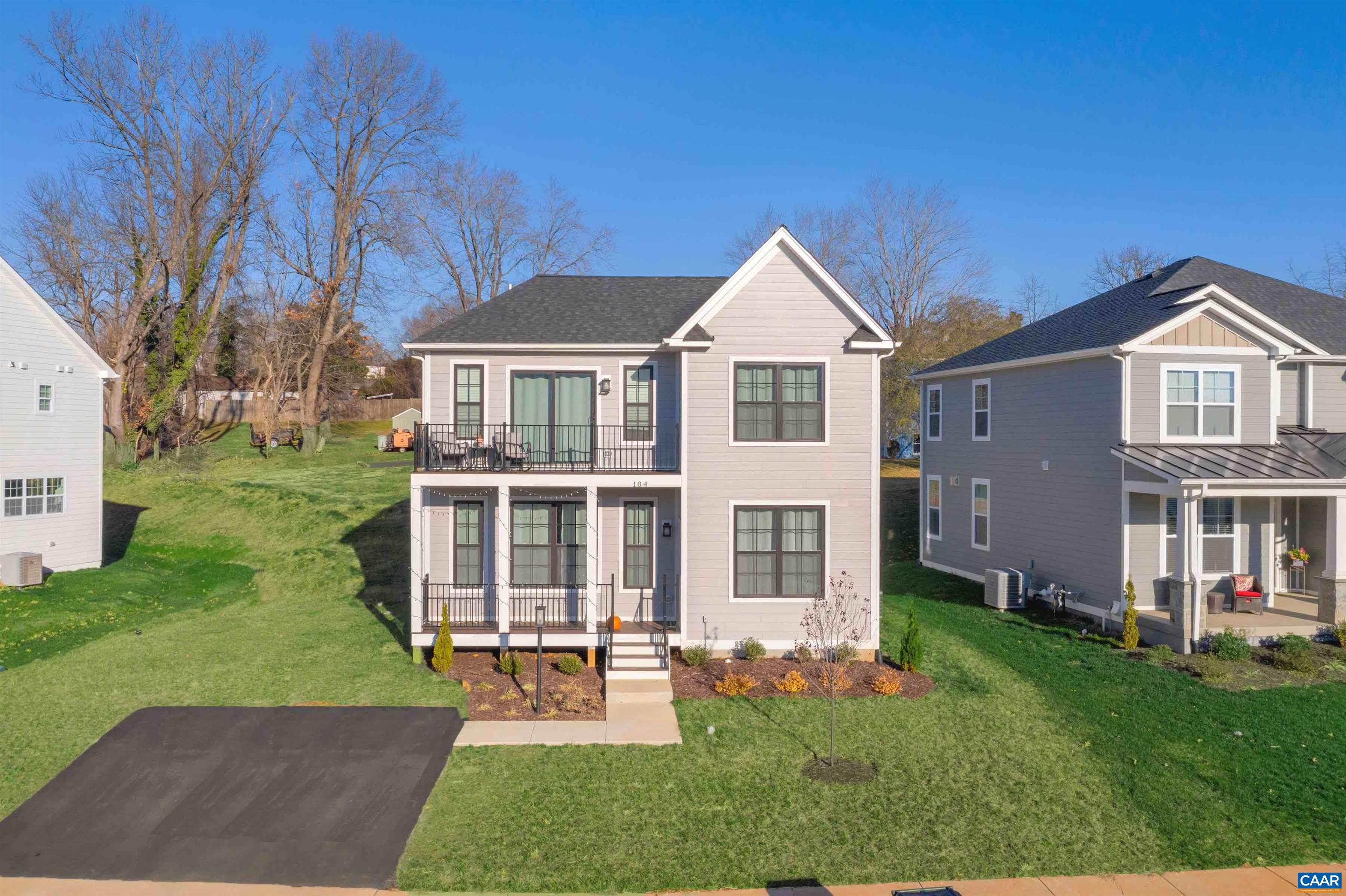 front view of a house with a yard