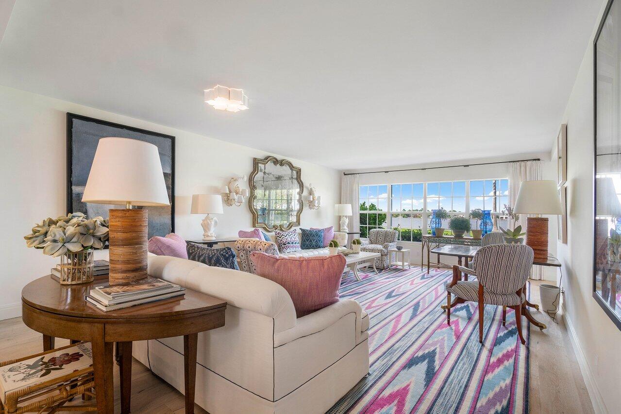 2170 Ibis Isle Road, Unit 3 Palm Beach, FL 33480 - Photo 3 of 12 a living room with furniture and a large window