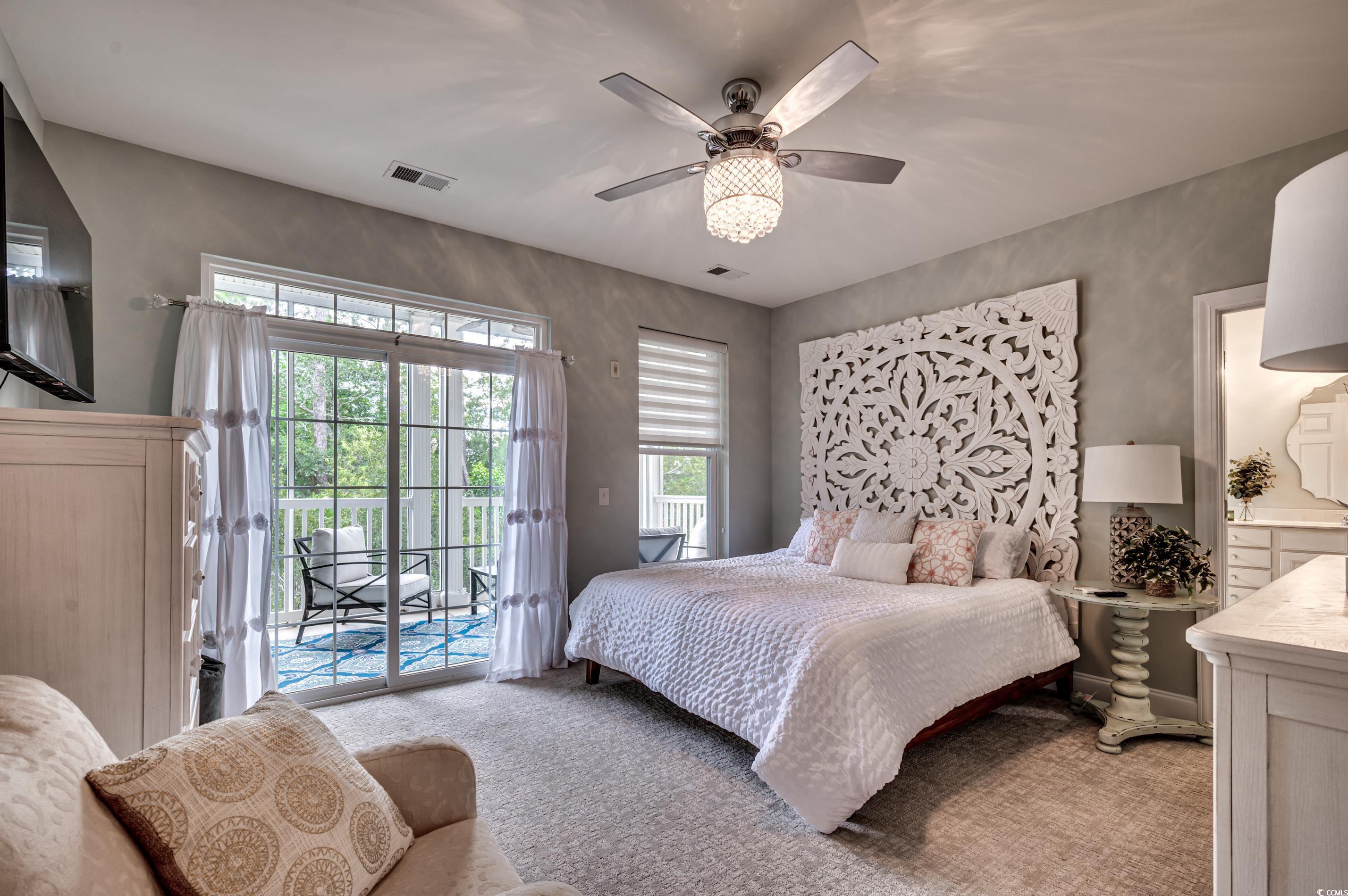 701 Pickering Drive, Unit 203 Murrells Inlet, SC 29576 - Photo 17 of 35 Doors opening to the screened patio